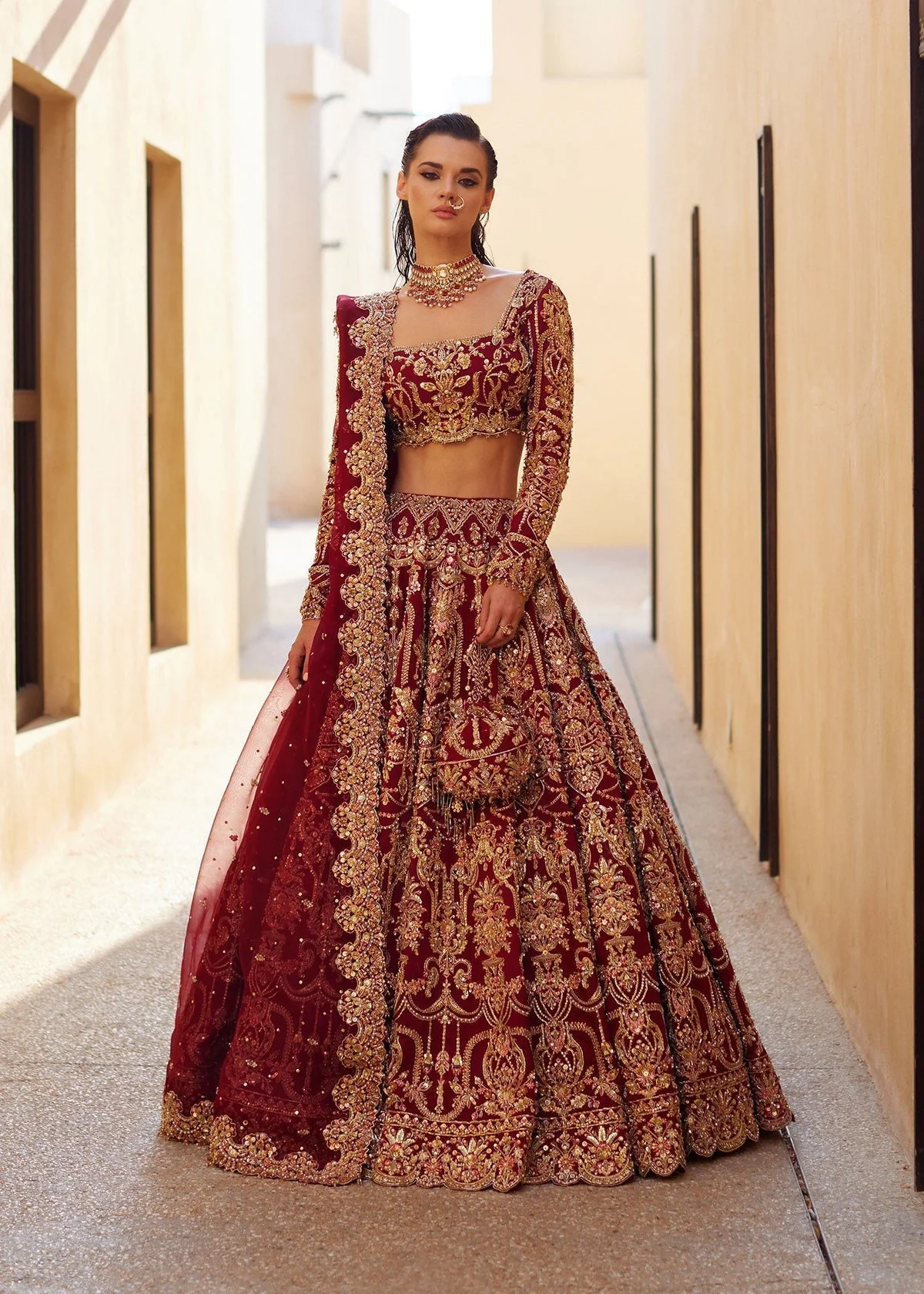Kanwal Malik – Zarwa in deep red and gold – full outfit view